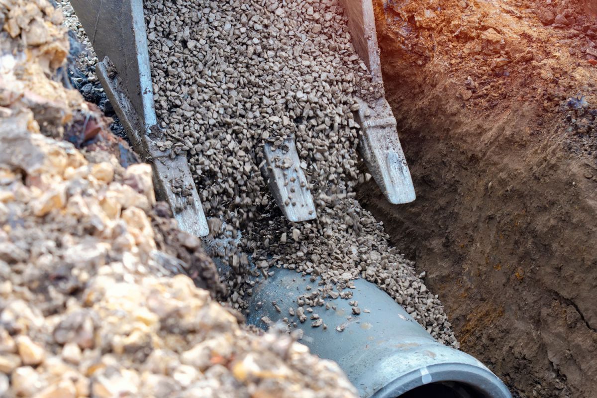 Digger at work for Fire Sprinkler System Installation